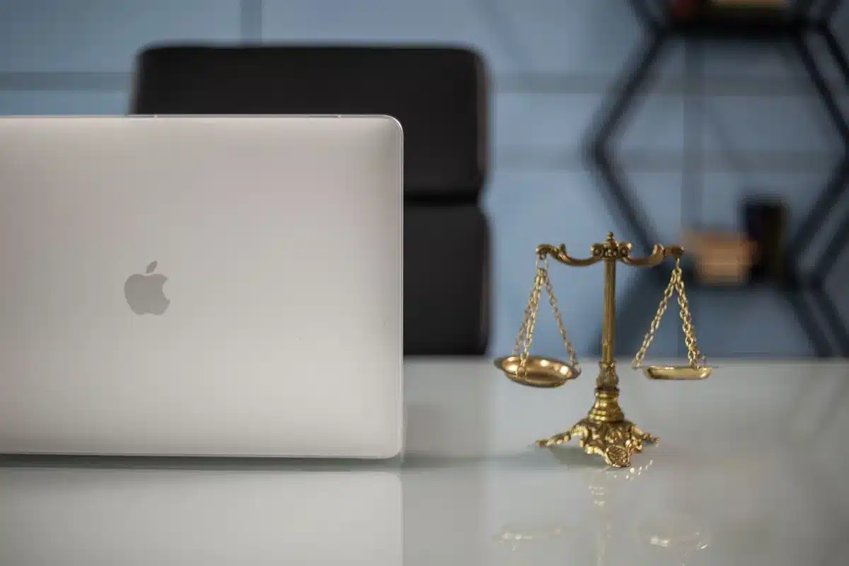Laptop and scales of justice: legal review of a right to be forgotten case
