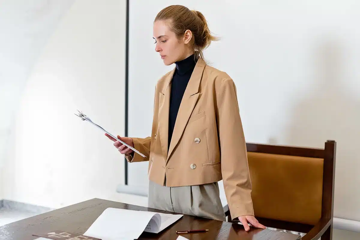 Lawyer reviews the documents to claim the removal of the fake profile
